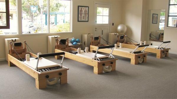 The Reformers, used in group Reformer class, Reformer Combo classes and private sessions.