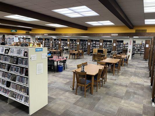 Overview of inside library with tables for studying