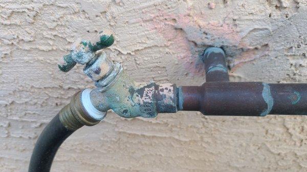 BEFORE shot of the sun-drenched garden hose spigot in our backyard. It was leaky and overall, starting to fail.