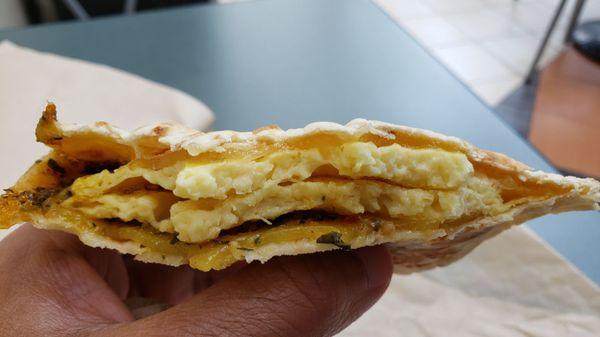 Interior of Just Egg roasted tomato and pesto flatbread ($7), vegan by default. Not bad. Hearty, but a tad oily.