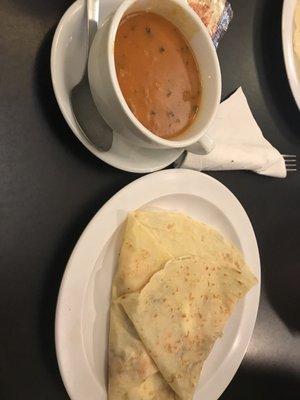 Salmon crepe with side of tomato bisque