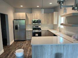 Kitchen with peninsula and floating shelves