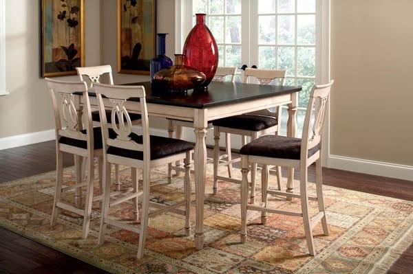 Furniture Plaza offers formal dining tables, kitchen tables, pub and counter height tables in almost every shape and finish.