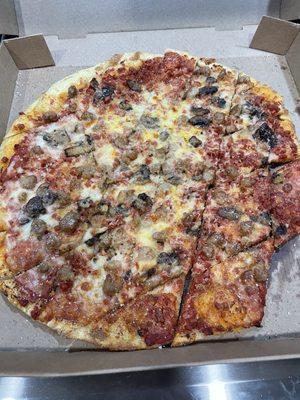 Double pepperoni, sausage and mushroom pizza.