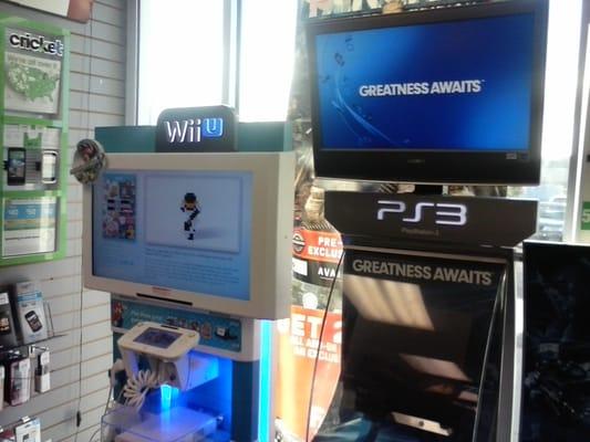 WiiU and Playstation near entrance.