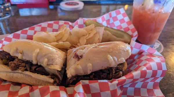 Rachel was quick to take my order. My bloody Mary had a pickle. It was good. Lunch was a Philly cheese steak with chips and pickles.