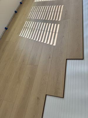 Laminate Flooring Installation and Materials (Warm tones trending)