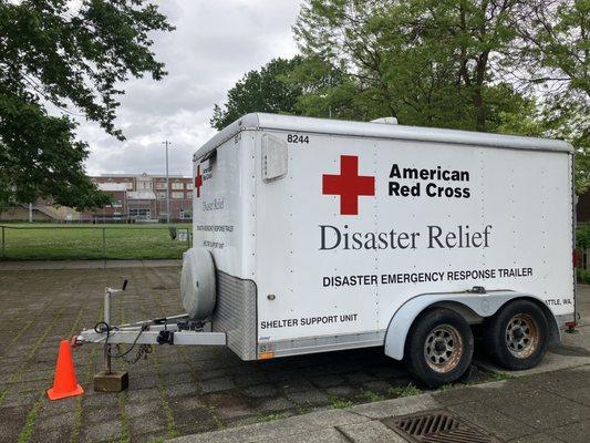 A trailer full of emergency supplies sits outside a shelter in Seattle, WA.