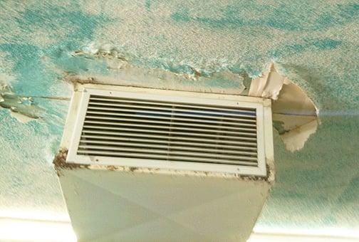 Popcorn ceiling coming down around the A/C.