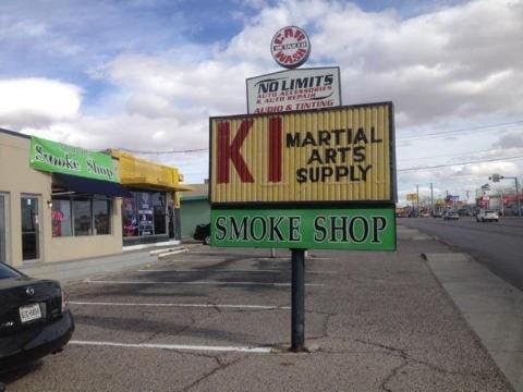 Next to The K1 Martial Arts Supply! Get your smoke on and kick butt!