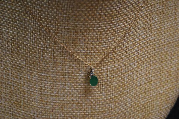 14K YG DIAMOND AND EMERALD CHAIN.