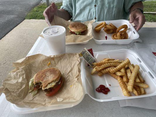 Both Cheeseburger meals one with fries and other with onion rings