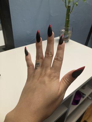 Acrylic stiletto shape nail black with red French tip