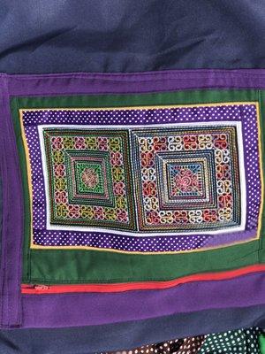 Hmong infused embroidery apron.