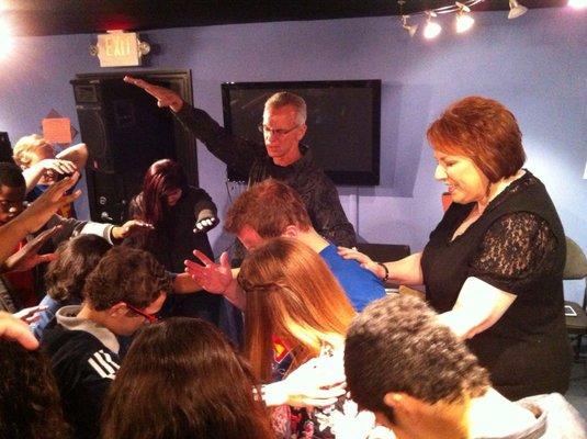 Pastors Steve and Becky Smith, praying over WPC's EPIC Youth Group