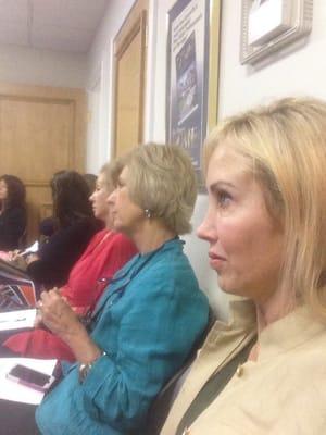 Liz Snide, Suzy and Janice Peterson in sales meeting on Tuesday mornings.