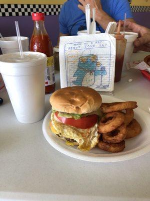 Grill Burger all the way with a fried egg on top! With a side of onion rings!