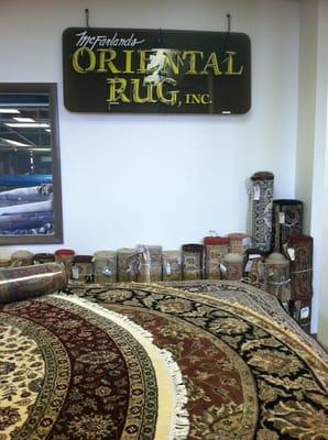 Rugs of all shapes, sizes and colors for sale inside the showroom