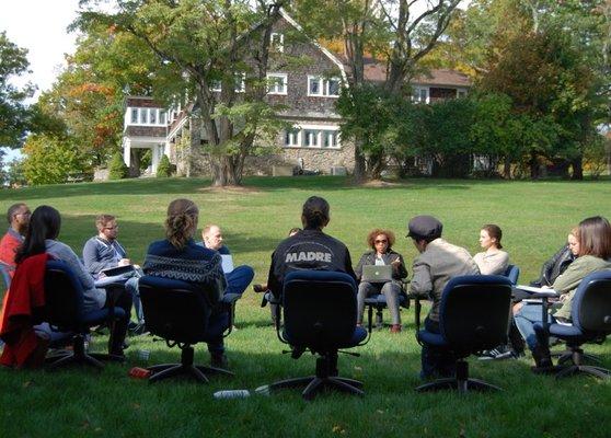 A group moves their meeting outside to our 100-acre campus.