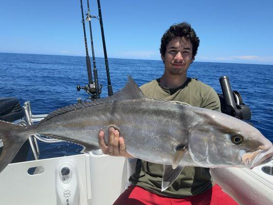 Amberjack held at arms length