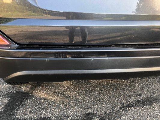 Rear ended - bumper scratched, dented, and needed to be replaced