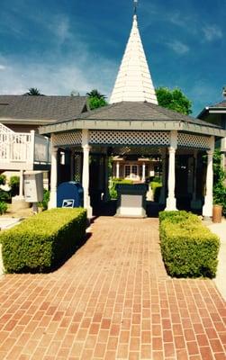 From the parking lot, walk through the gazebo.