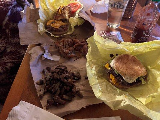 Truffle fries (the brown stuff), onion rings, double jalepeno burger, truffle burger