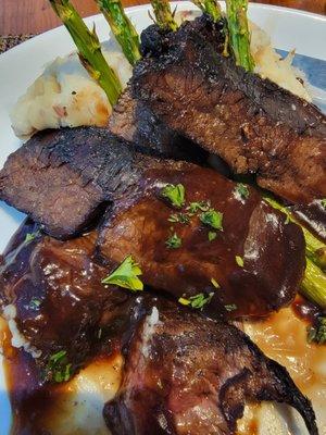 Skirt Steak with mashed potatoes and dried up asparagus.