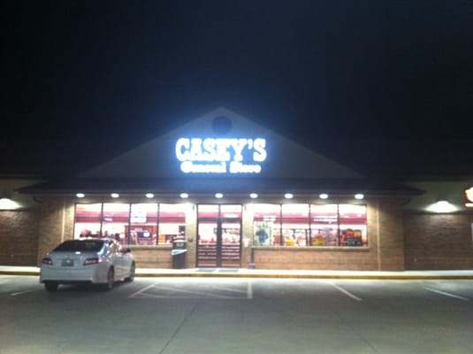 Front of the store at night.