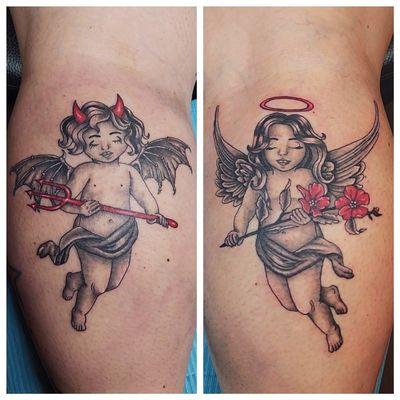 Devil and angel calf pieces. Black and grey with popps of red.