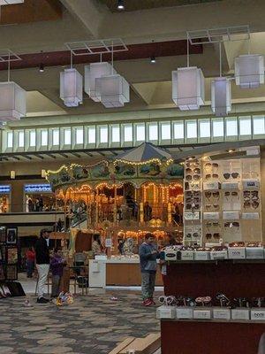 Vendors in front of the carousel