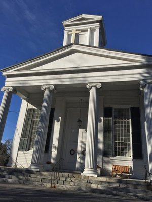 St. Luke's church under a beautiful blue sky.