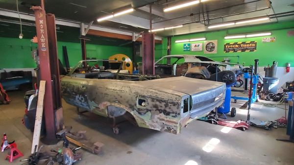 1968 AMC Rebels being chemically stripped.