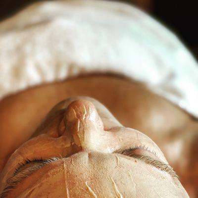 Signature facial with a Turmeric  & Banana skin tightening mask.