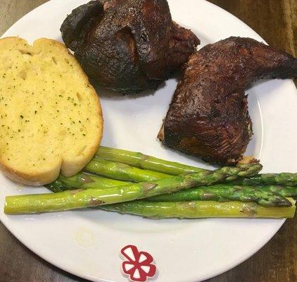 Half Chicken BBQ with garlic toast and asparagus