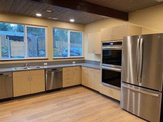 Two dishwashers and a large sink