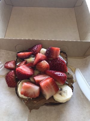 Almond butter with fruit on whole grain toast.  Mmmm!