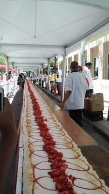 Thats one long strawberry shortcake!