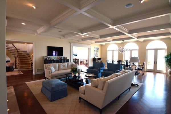 Coffered ceiling with crown molding. Cased openings