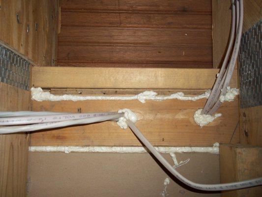 Air Seal holes created by wires, plumbing, and joints