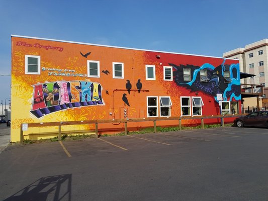 The mural on the side of the building