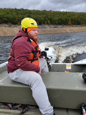 Brent operating the boat.