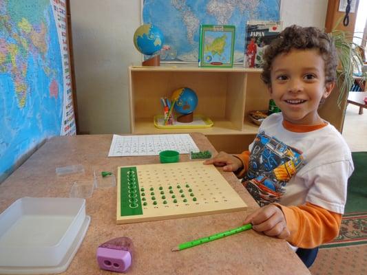 Students learn and practice division with manipulatives before moving to abstract  paper and pencil tasks.