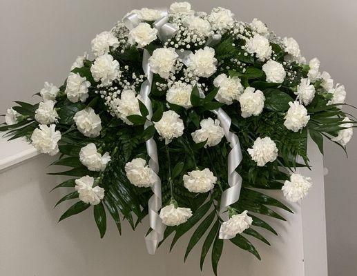 Carnations, Baby's Breath, and Mixed Greens of Casket Cover