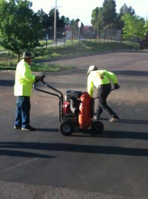 Crew cleaning parking lot