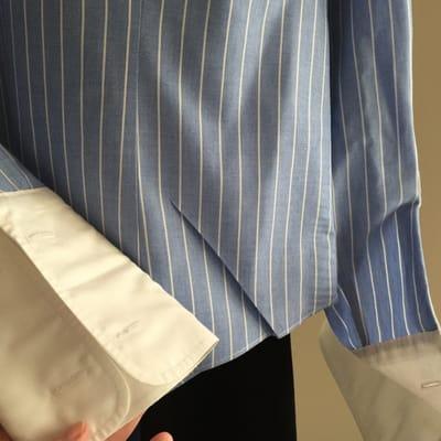 This is what they call ironed. Notice the cuff and the creases they ironed into the shirt (& not in any place a crease should be).