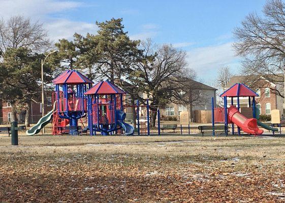 Seasonal water fountain is near the playground (on left in photo).