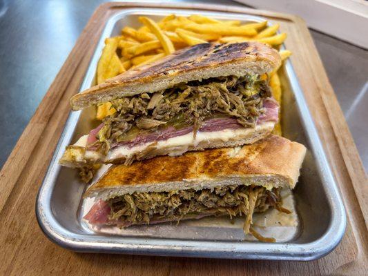 Cuban sandwich served with hot fries