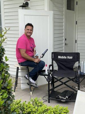 Jon-Paul with his chair and hair equipment