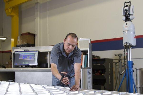 Verisurf software and Leica laser tracker inspecting iso grid panels for NASA SLS launch system.